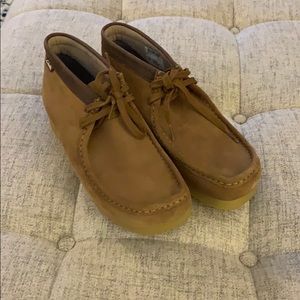 Tan Suede Clark’s Wallabees.